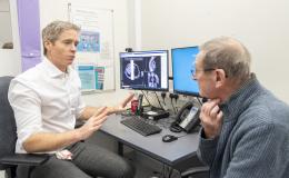 Prof Hiley with a patient in clinic