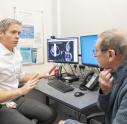 Prof Hiley with a patient in clinic